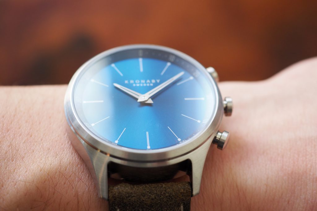 Bright blue sunburst dial on wrist