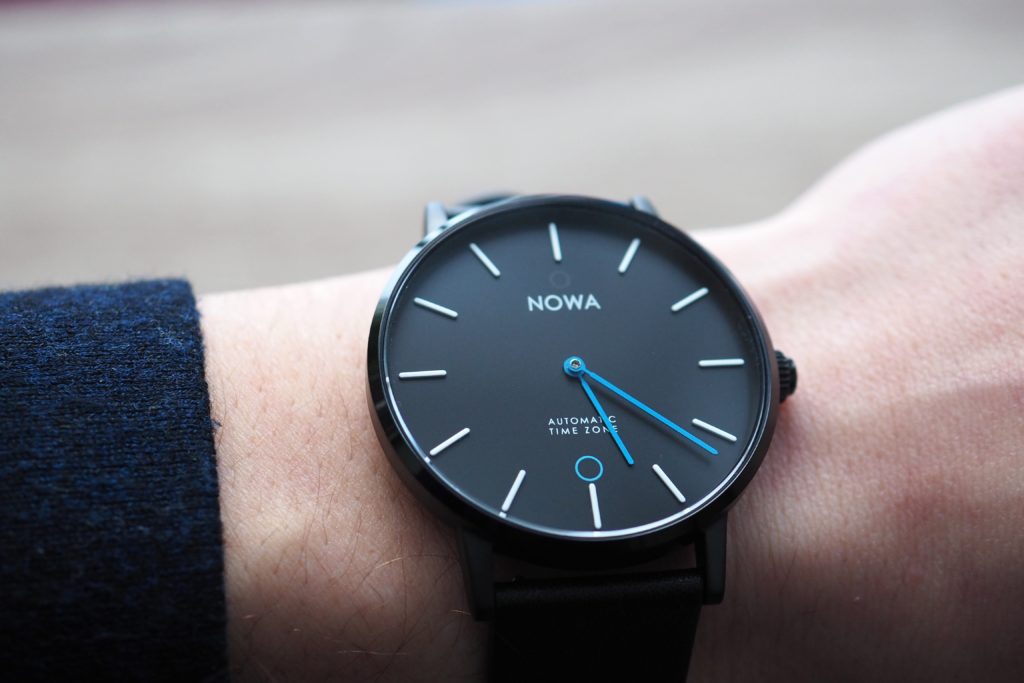 Nowa black dial blue hands