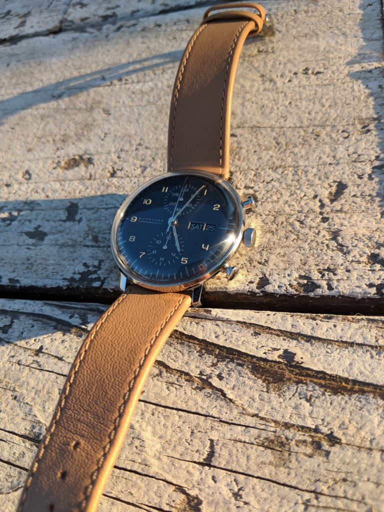 Leather band and deep shade of dial