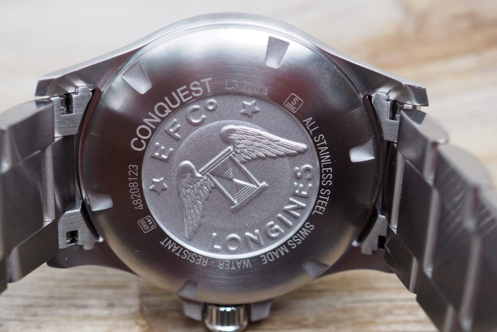 Longines logo engraved back of watch