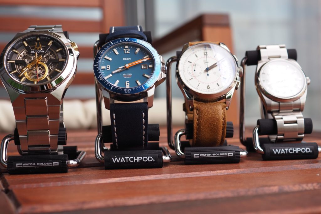 Watch stands with watches on