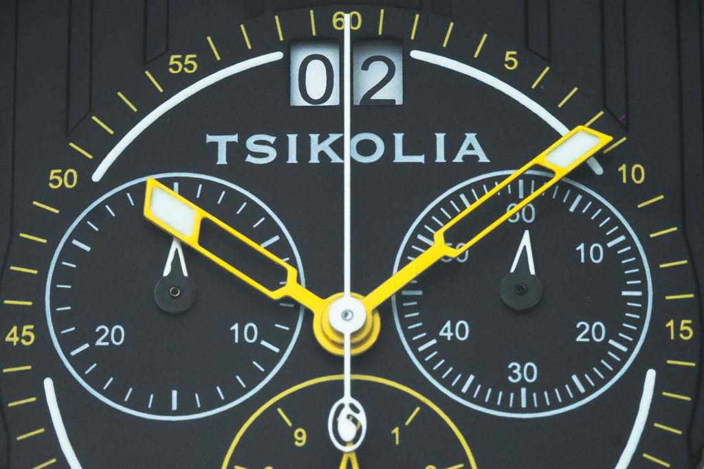 Macro of Tsikolia logo on dial