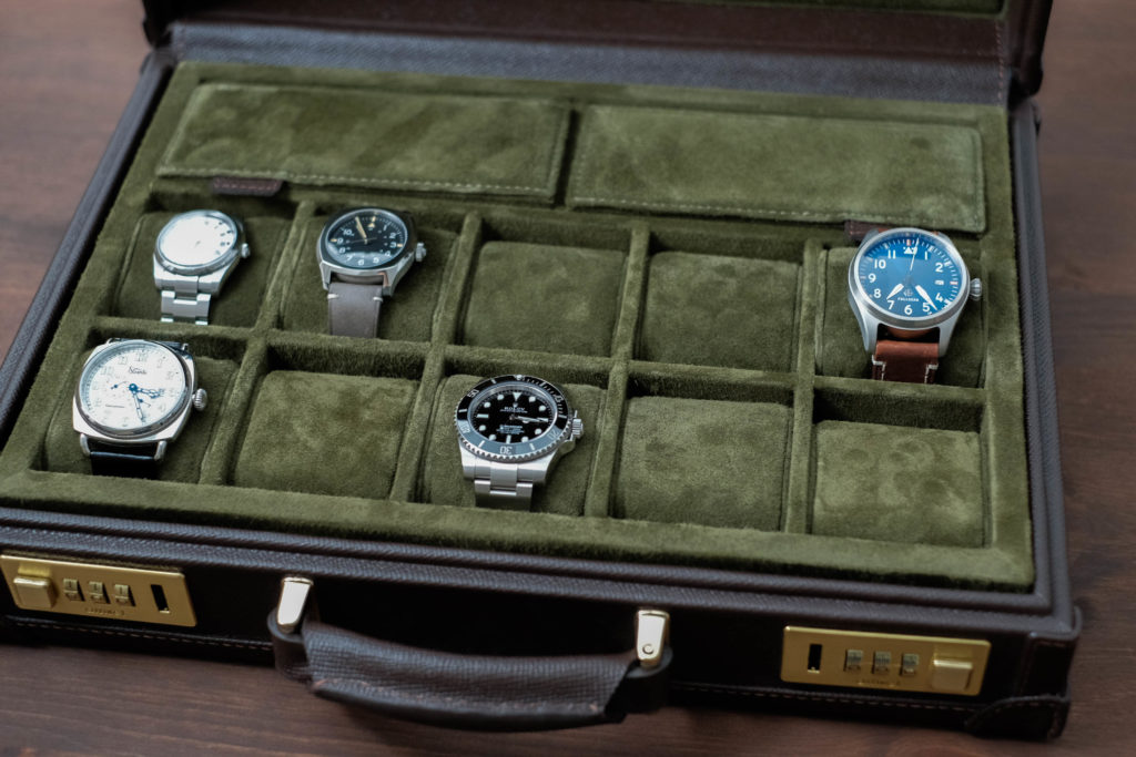 Entire interior of display case with watches