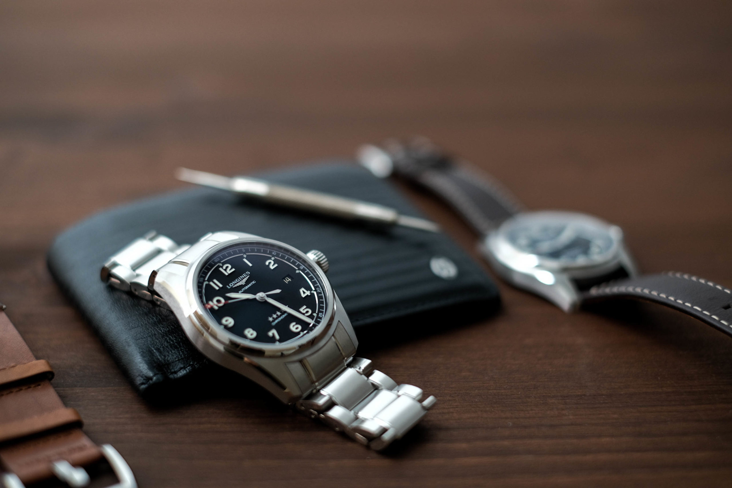 Watch with tool and wallet