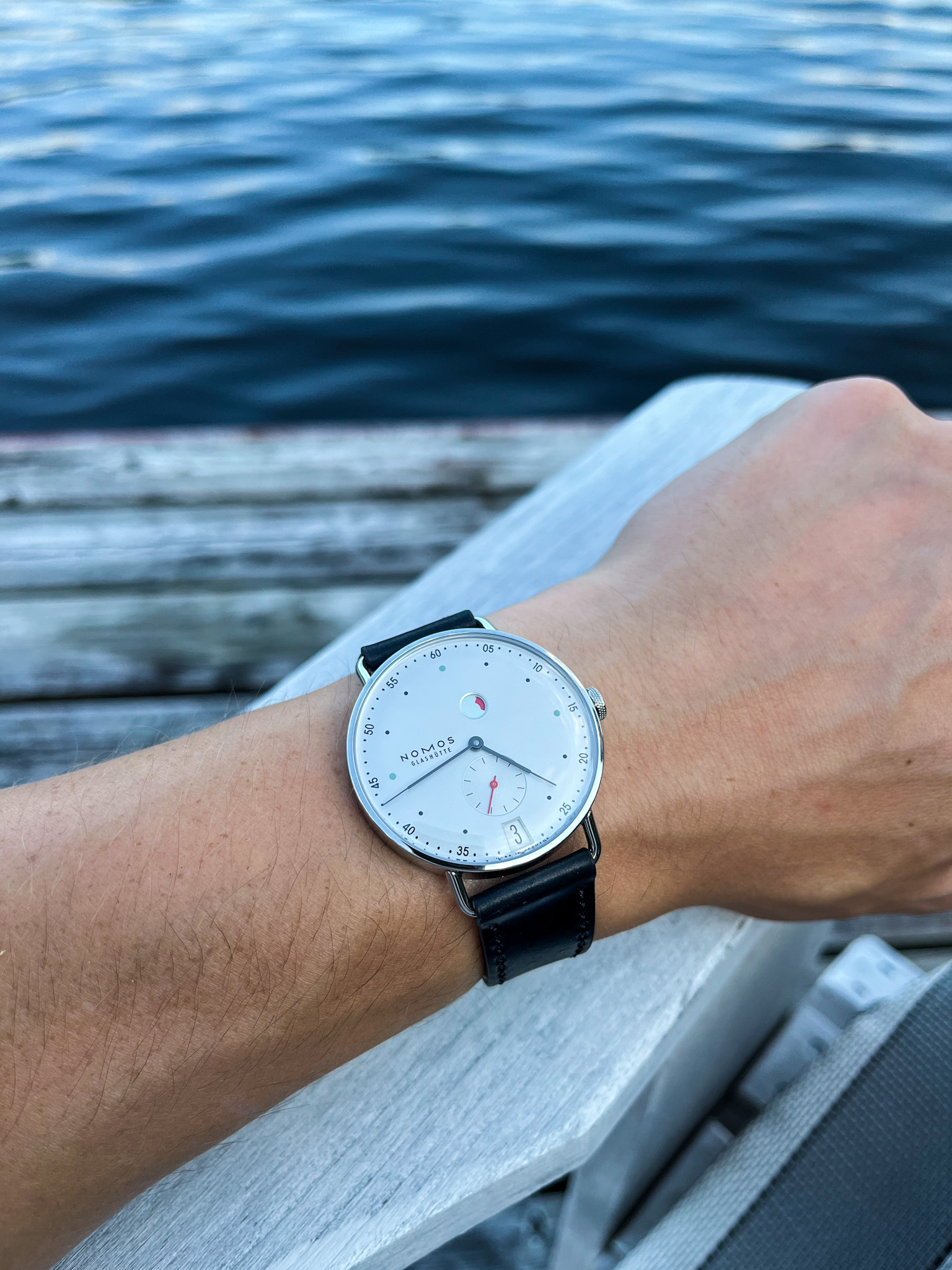 Nomos metro power reserve wrist shot