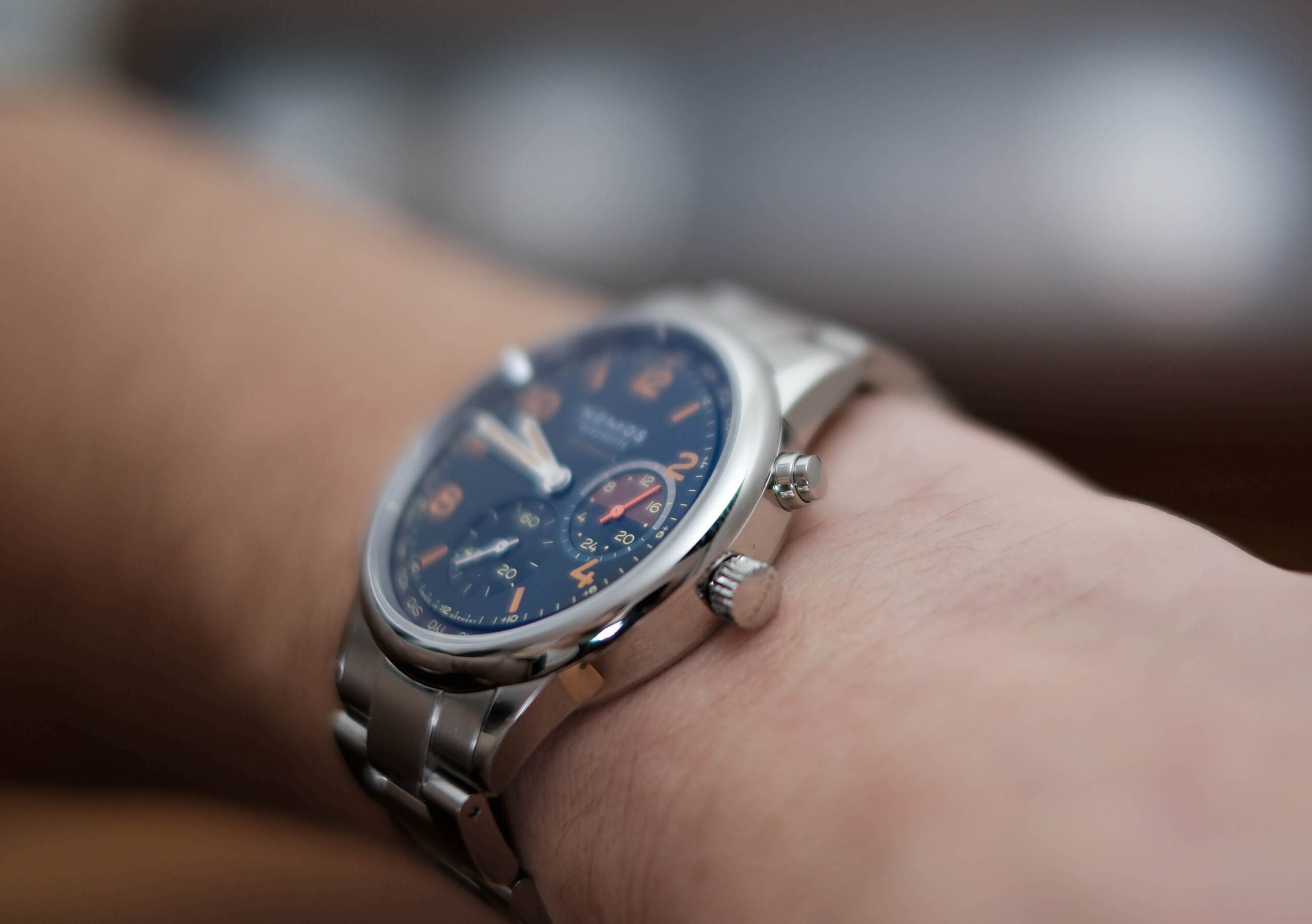 Nomos Club Sport Neomatik Worldtimer Side View On Wrist